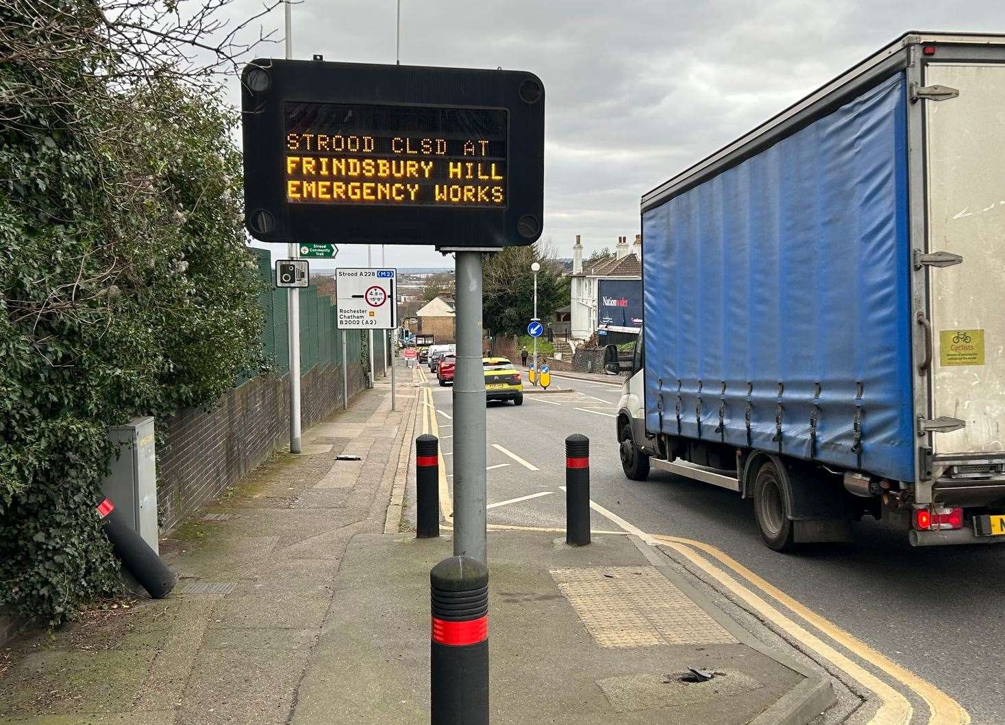 A sign warning of the closure of Station Road in Strood for emergency gas works