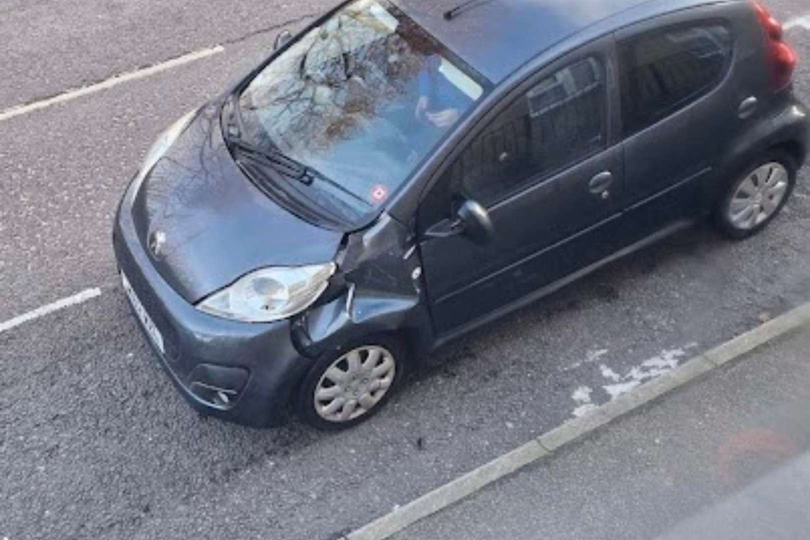 A peugot involved in the crash has been damaged