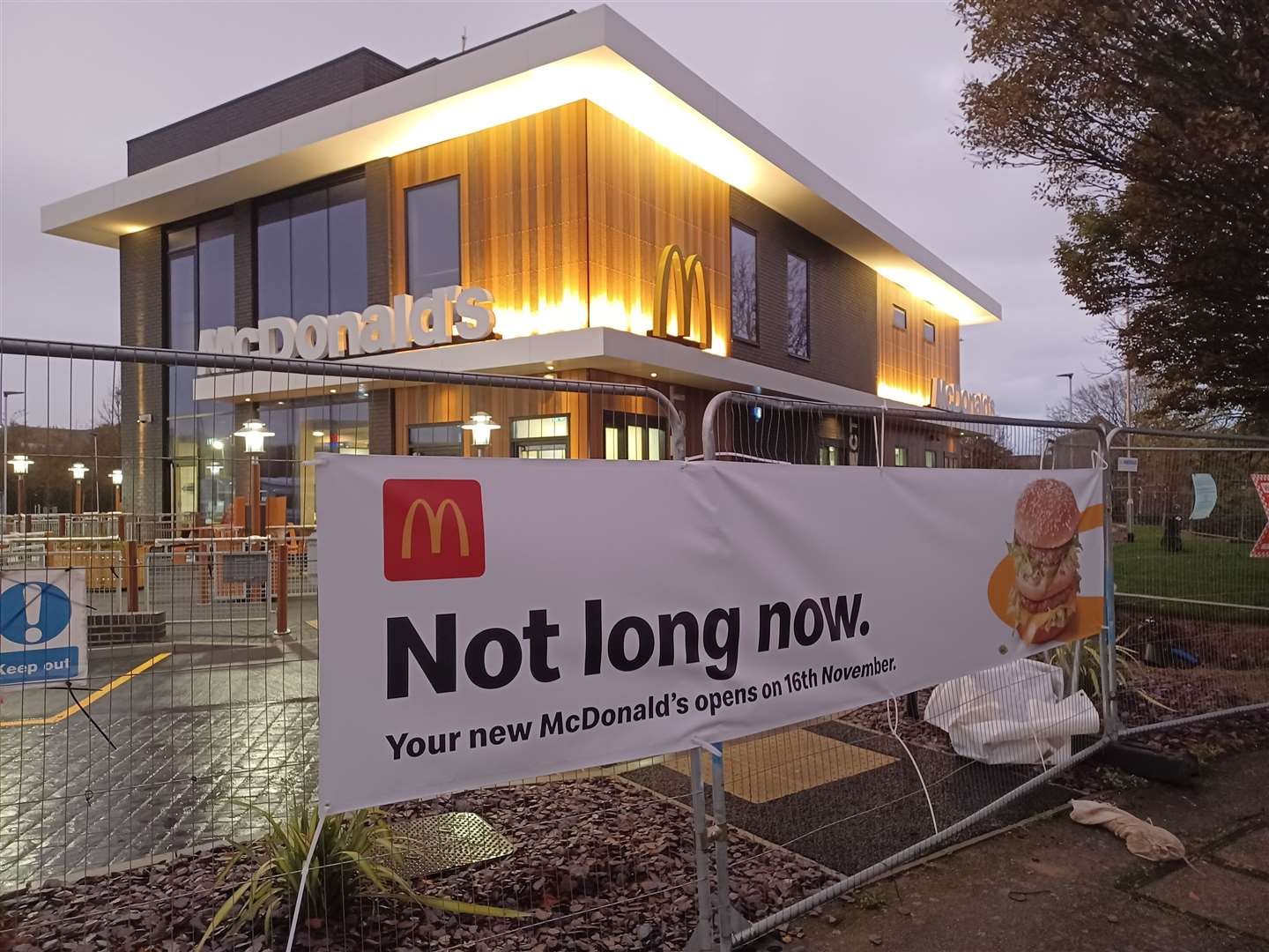 The banner confirming the McDonald's will open on November 16