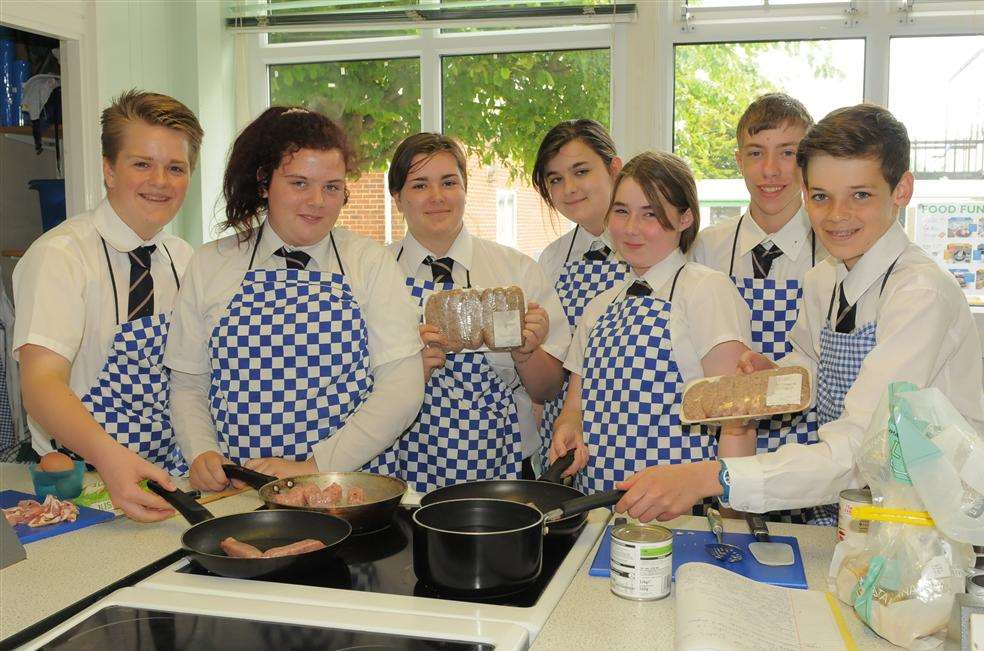 Pupils making meals with sausages at Westlands School, Sittingbourne