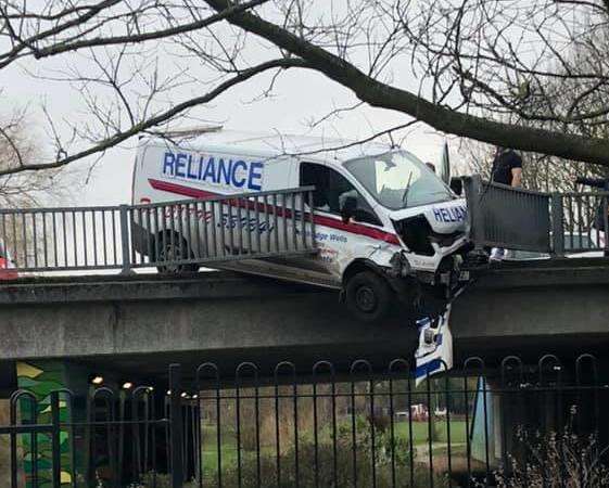The van has been left teetering over the bridge. Picture: Ben Thorne.