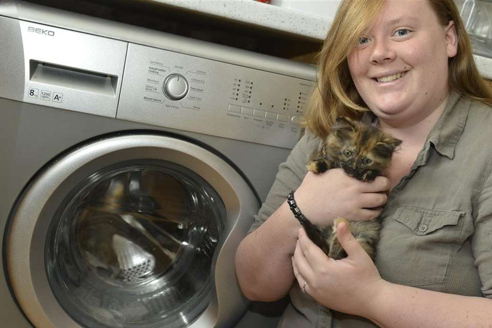 Lauren Gavin with her miracle kitten Gollum, who survived a full cycle in her washing machine