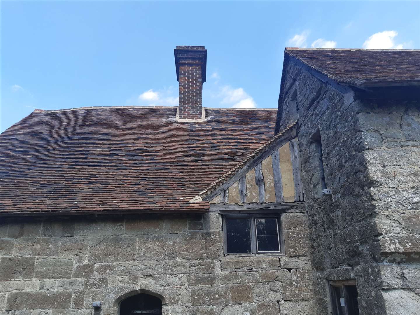 The roof of the old house has been repaired
