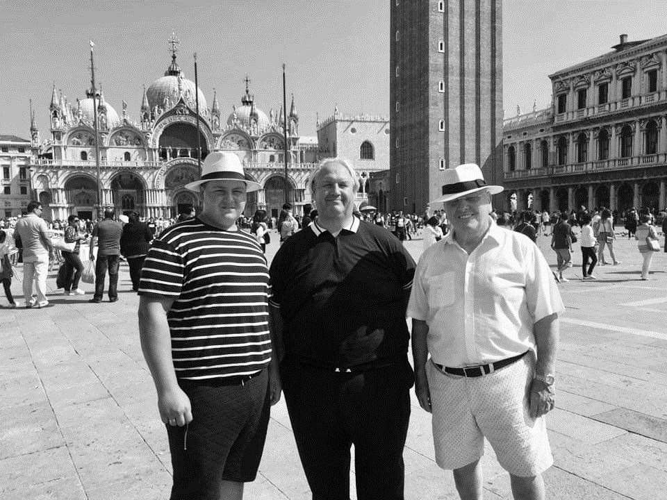 Three generations to have worked at Mitchell's Carpets on holiday in Venice, Italy. From right: Bill Mitchell with son-in-law Jim, centre and left, grandson Sammy. Photo: Rose Redworth