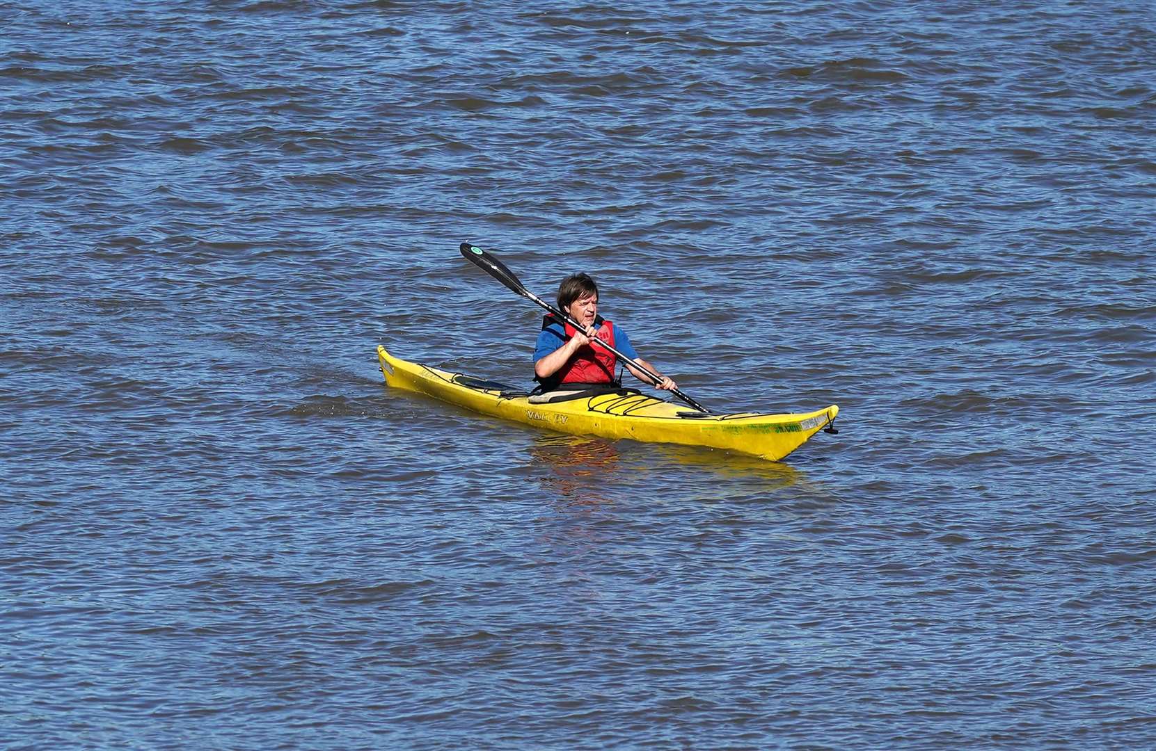 A canoeist on the River Thames (John Walton/PA)