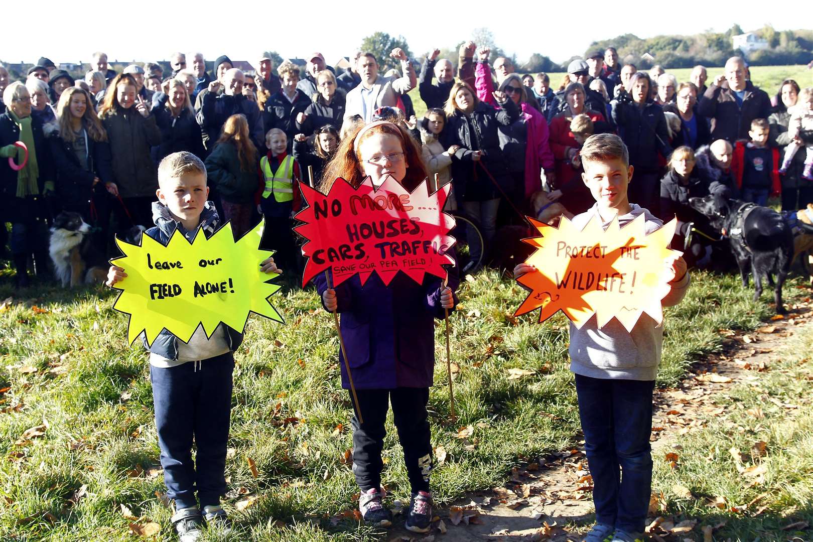 Angry residents gather to protest about potential develpment on Barming pea fields, Barming.Joseph Rutter 8, Emily Sturrock 9 and Samuel Rutter 10 who live at Reed Wood.Picture: Sean Aidan (5052862)