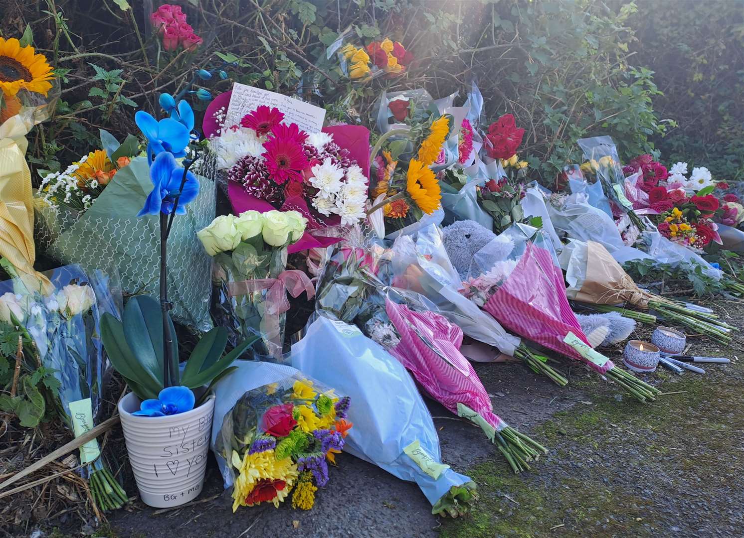 Flowers and candles were left near the scene of Bella Goldsmith's death