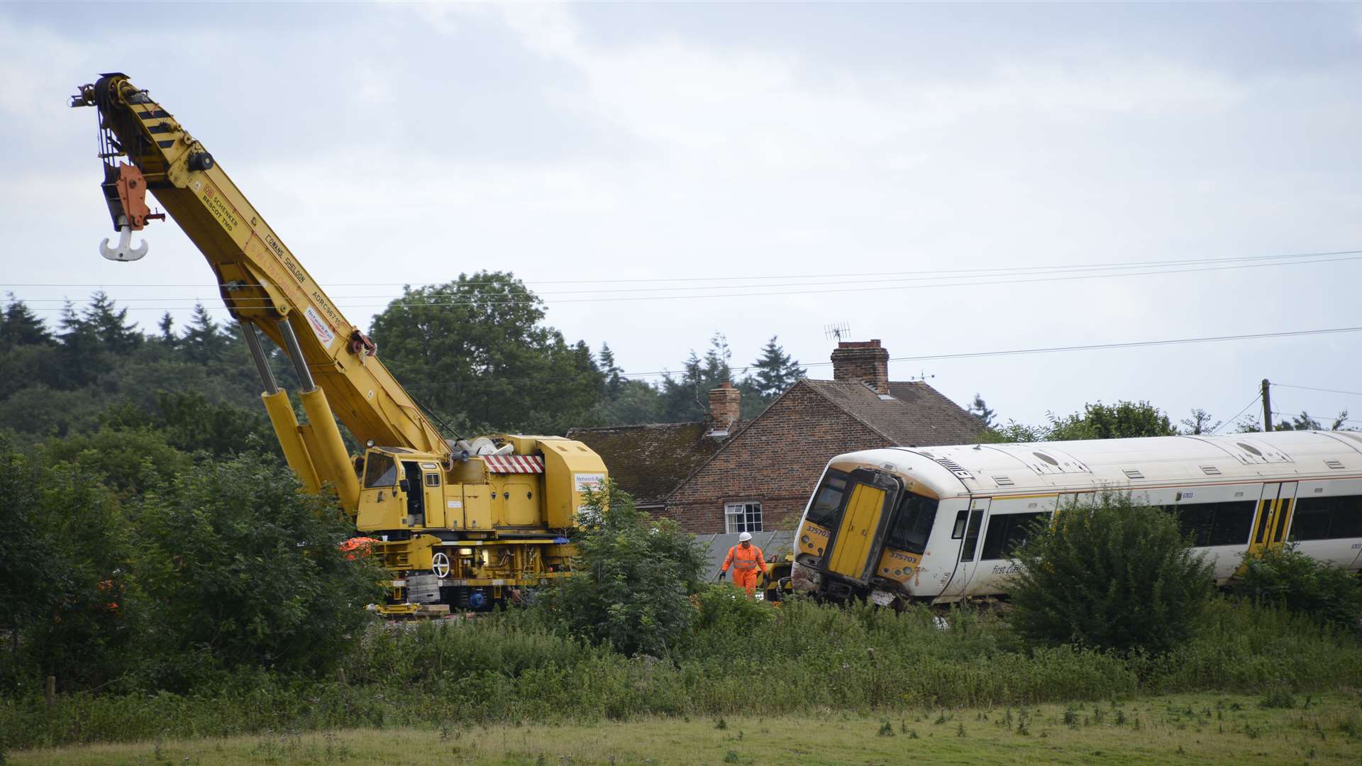 A crane lifted the derailed train back onto the tracks