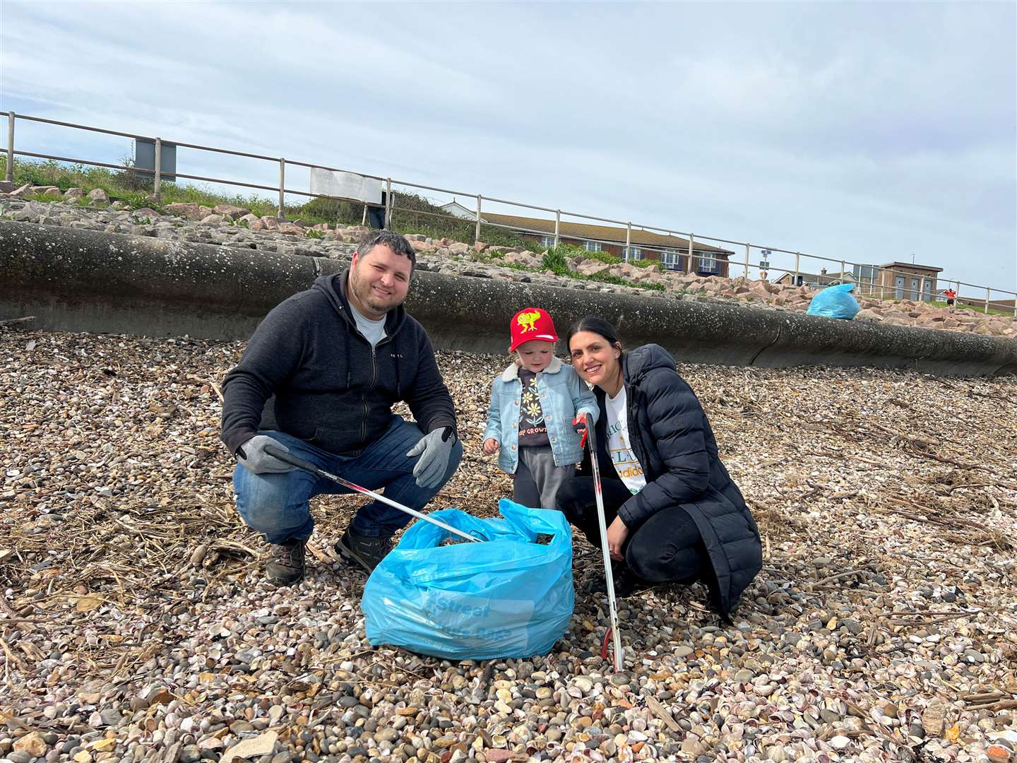 Thomas and Hayley Furnell, with their daughter, Aria, at the Minster beach clean