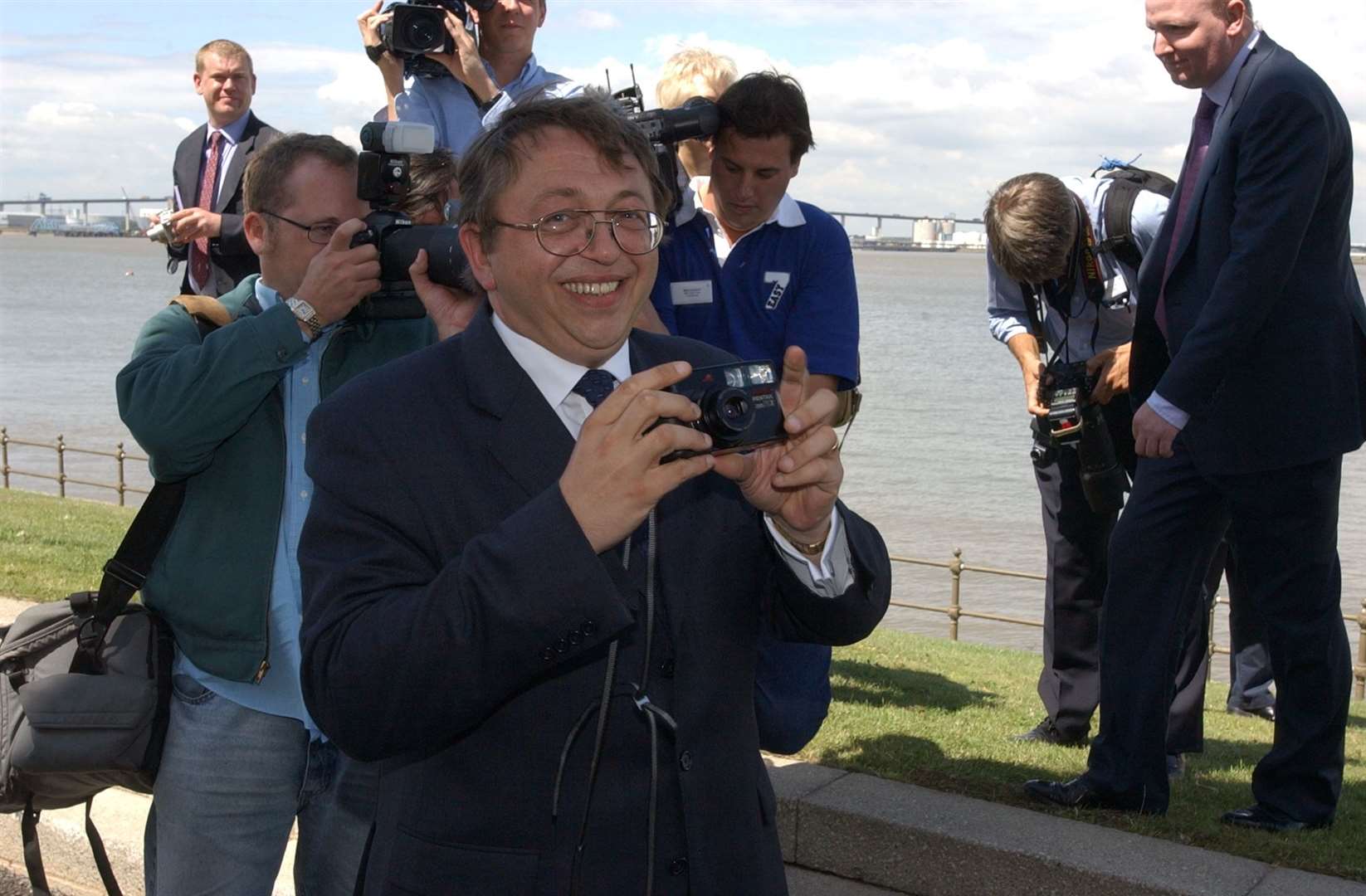Former Gillingham MP Paul Clark with a camera during a visit by Tony Blair and John Prescott to Ingris Park Greenhithe in 2003