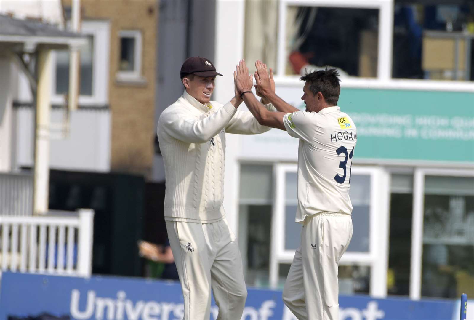 Michael Hogan celebrates with fellow Kent player Zak Crawley after taking a Northamptonshire wicket in their triumphant opening four-day fixture. Picture: Barry Goodwin