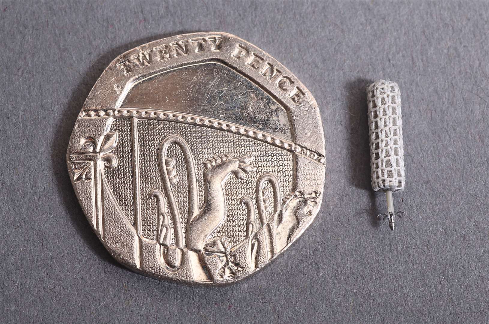 This "WiSE" heart implant consists of a titanium electrode covered by a polyester jacket - which encourages heart tissue to grow around it - with a platinum needle tip and five nitinol barbs.