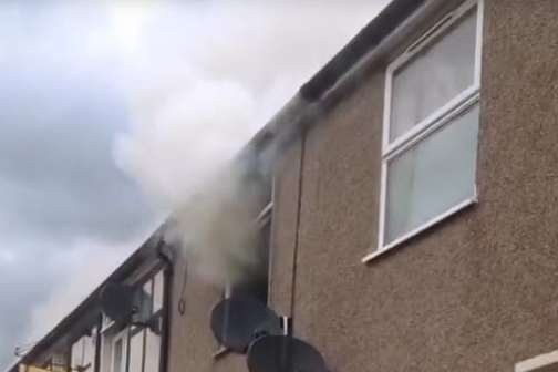 Smoke billows from the property in Craylands Lane, Swanscombe.