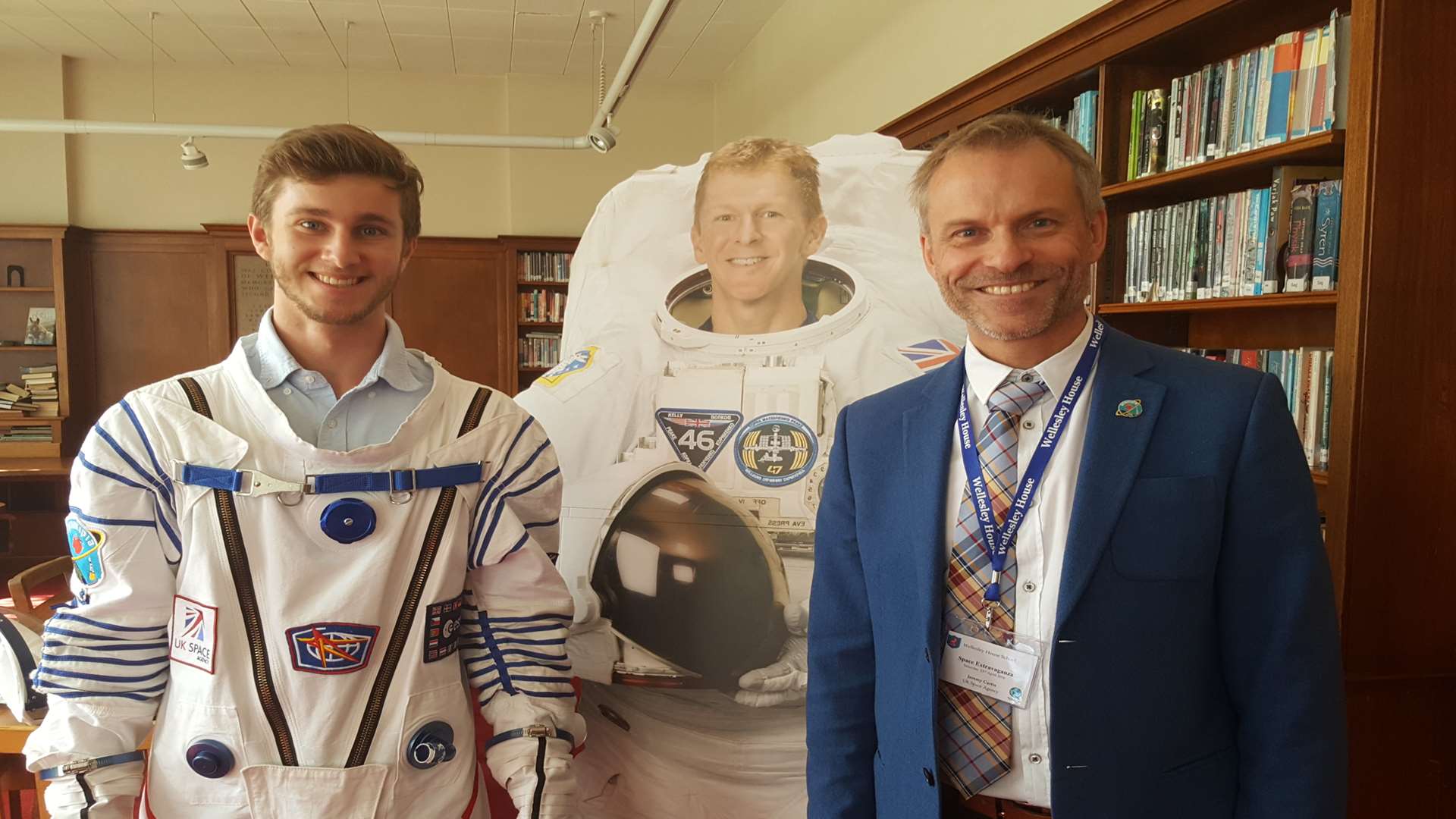 Harry Mills models a replica space suit with Jeremy Curtis, head of education and skills at UK Space Agency