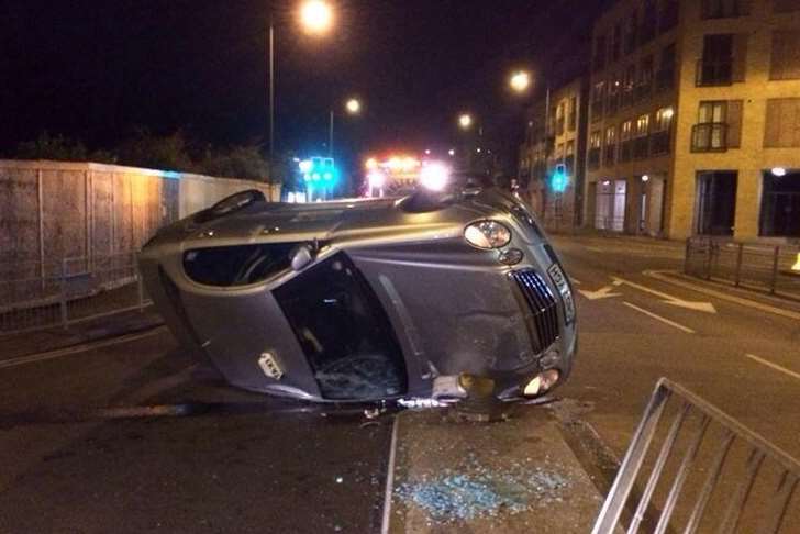 An overturned Mercedes taxi in London Road, Sevenoaks. Picture: @big8729
