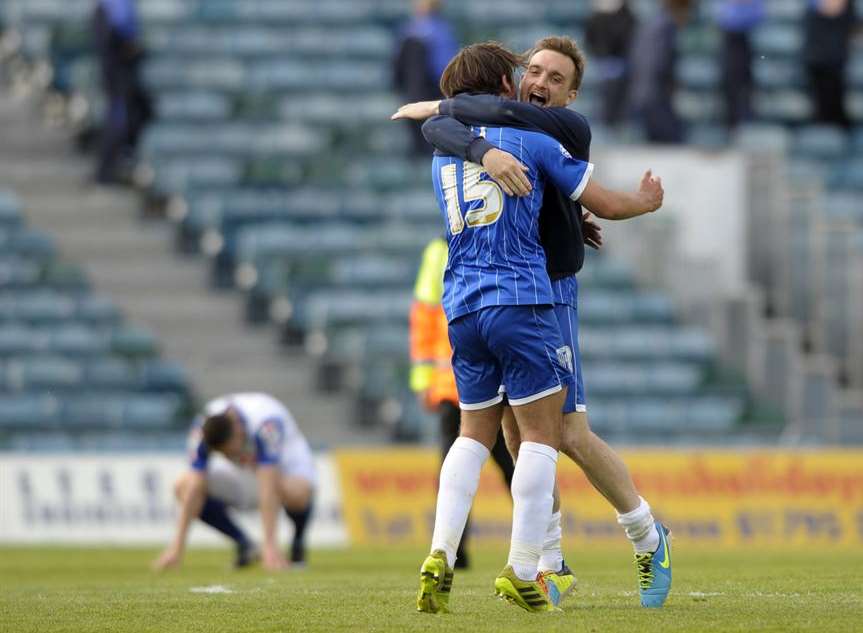 Bradley Dack and Charlie Lee celebrate at the final whistle Pic: Barry Goodwin