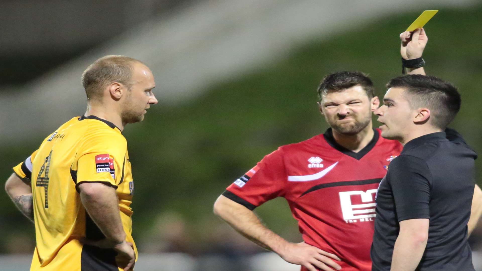 Maidstone's Steve Watt gets shown a yellow card