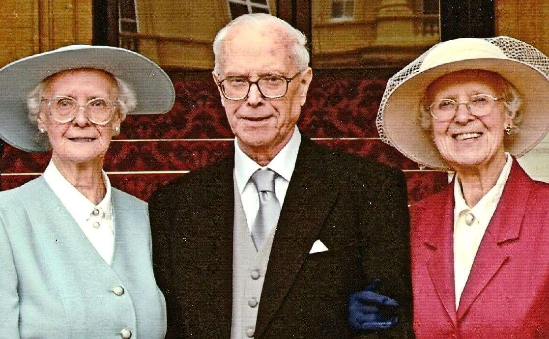 Sisters Kathleen and Dorothy with brother Cecil when he received an honour from the Queen. Mr Whitehead was a stalwart of the Scouting movement for half a century and mastermind of the Buckmore Park complex