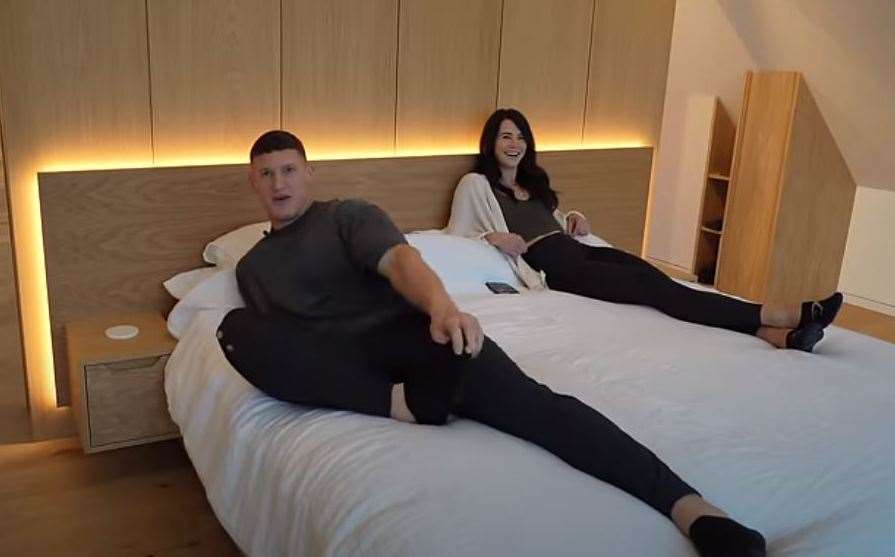 Matt Morsia and wife Sarah lounge in the main bedroom. Pic: YouTube/MattDoesFitness