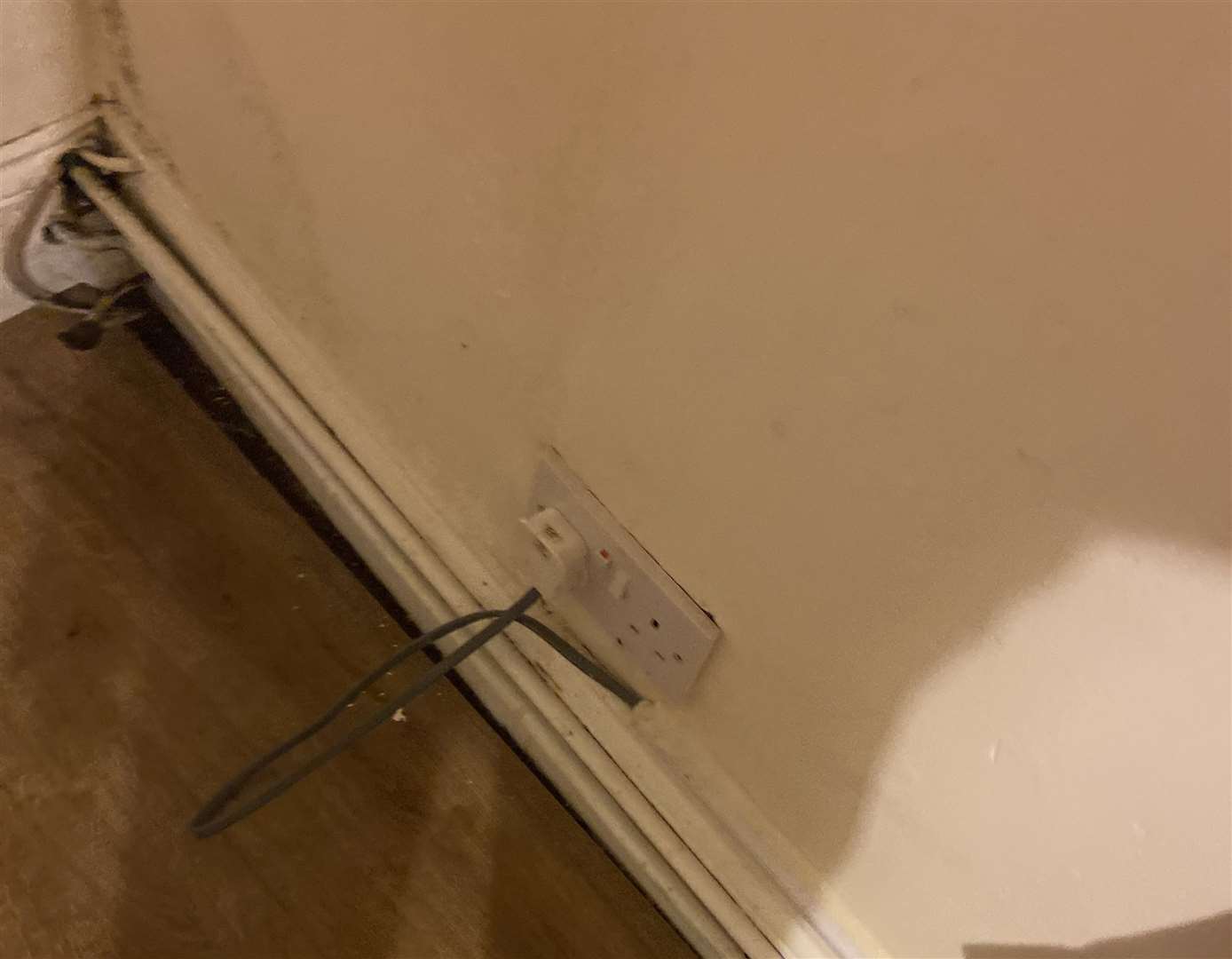 Wires coming out of the wall in the room at Ashford Central Guest House. Picture: Jade Connor