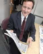 David Cameron at the KM office with a copy of the Kent Messenger. Picture: Grant Falvey