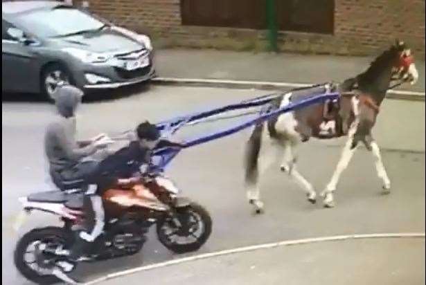 CCTV showed the pair riding off with a bike on Tuesday in Dartford (16477146)
