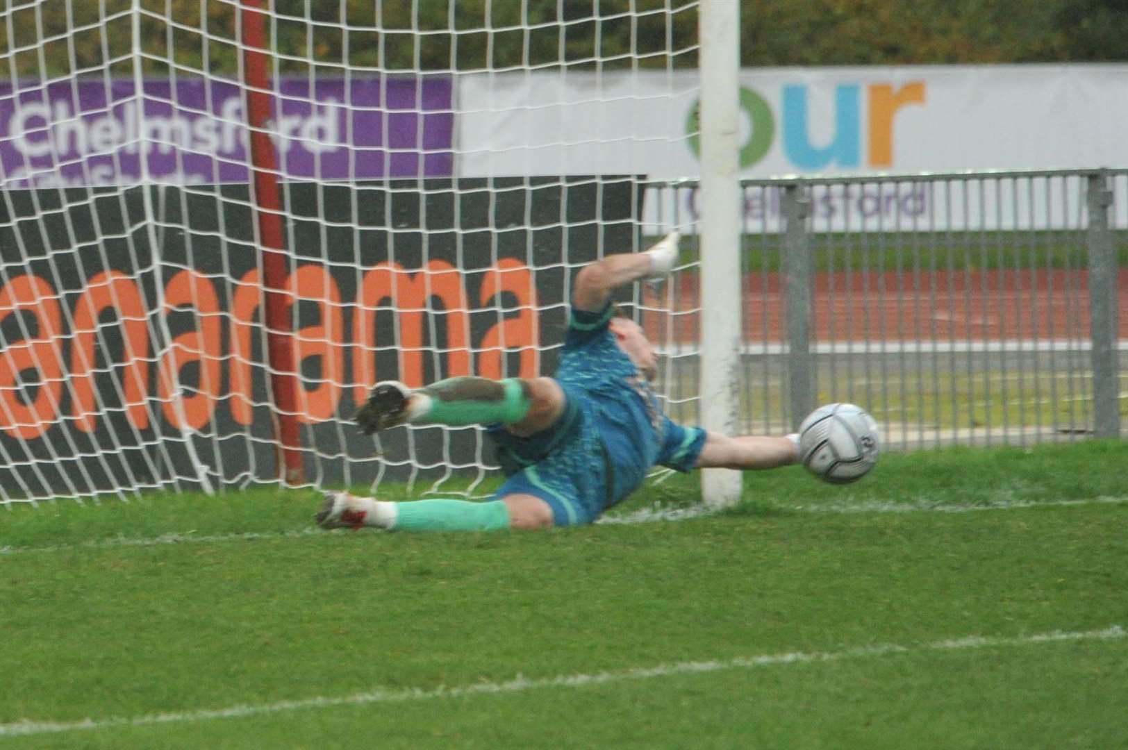 Former Maidstone keeper Lee Worgan saves Justin Amaluzor's penalty Picture: Steve Terrell