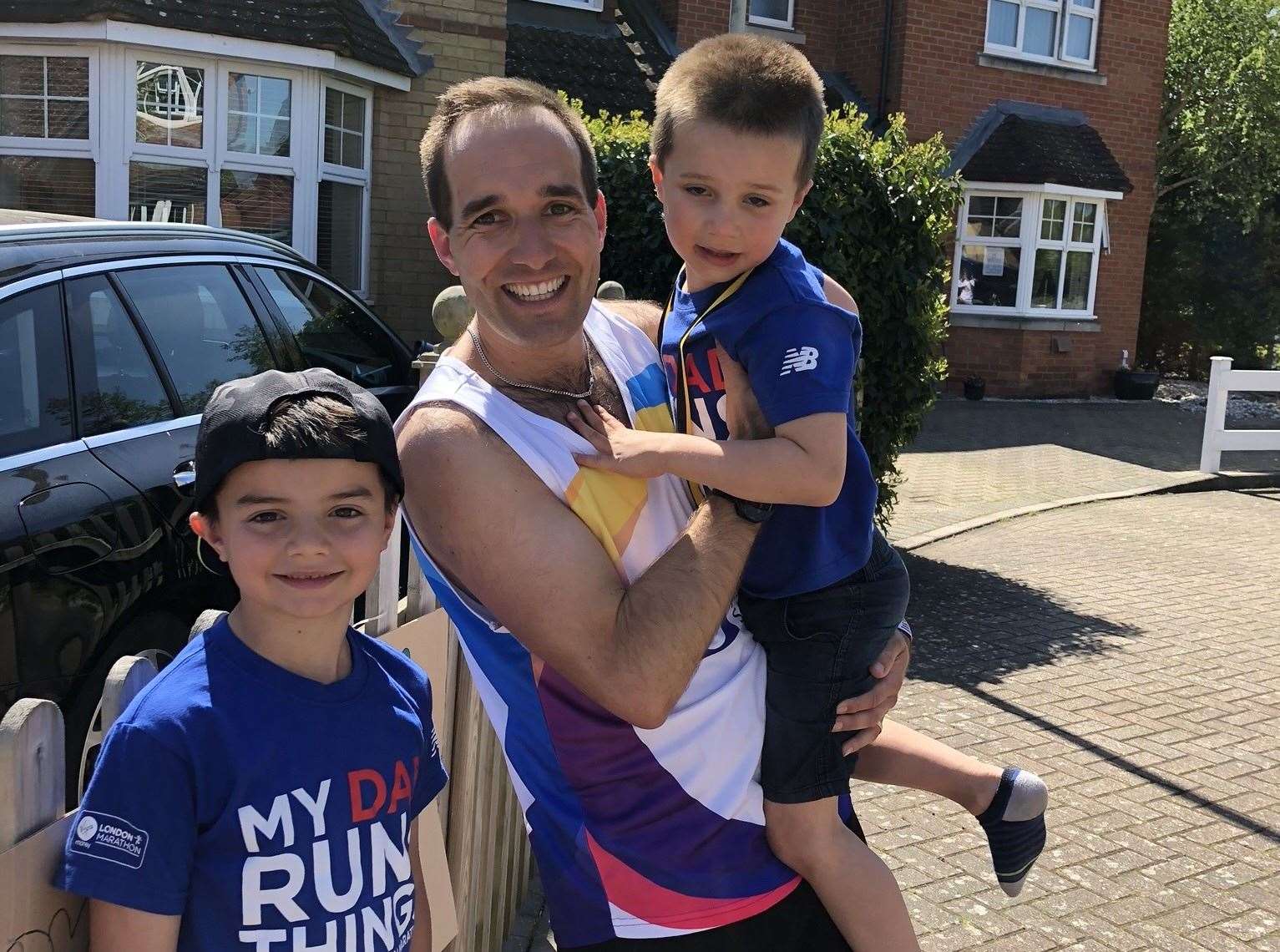 Chris Linkin with his sons at the 'finish line'