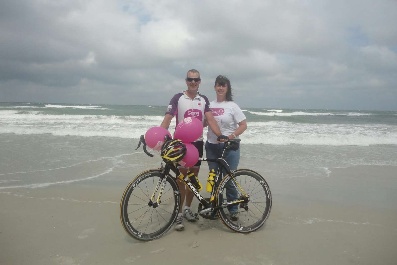 Matt and Caroline Loughrey in St Augustine, Florida, at the end of Matt's bike ride across America in memory of their daughter Emily.