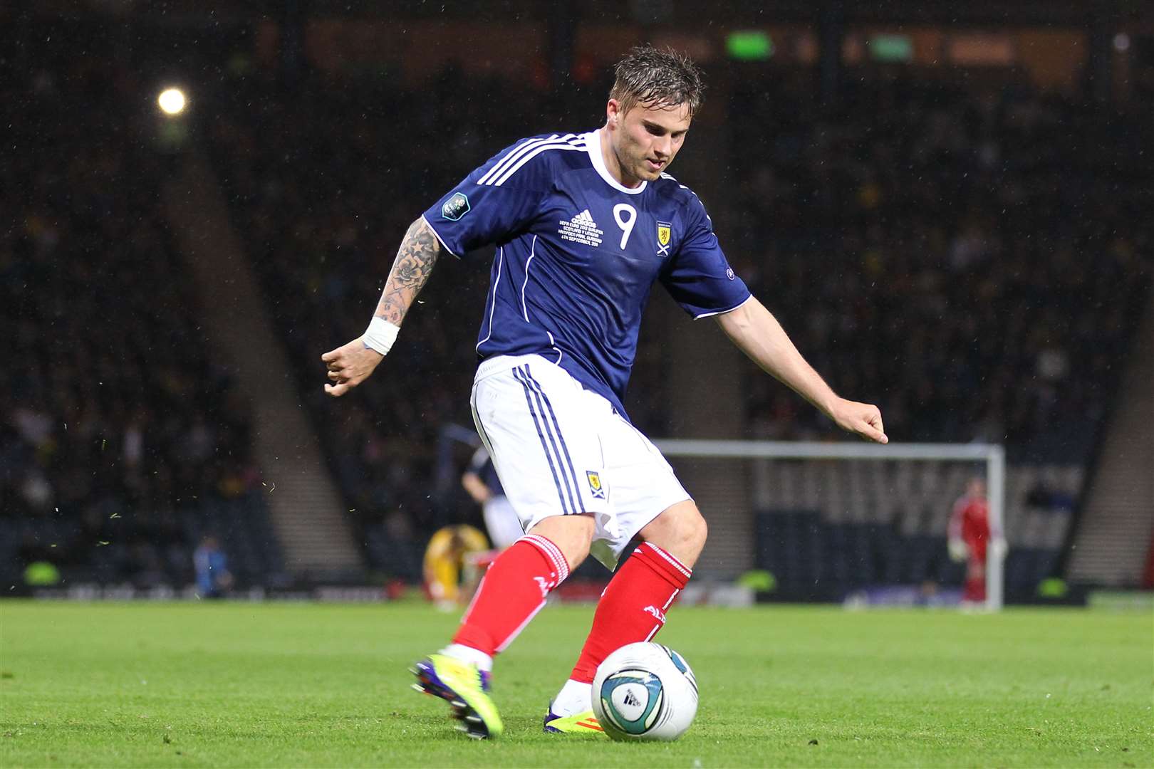 David Goodwillie playing for Scotland against Lithuania in 2011 (Andrew Milligan/PA)