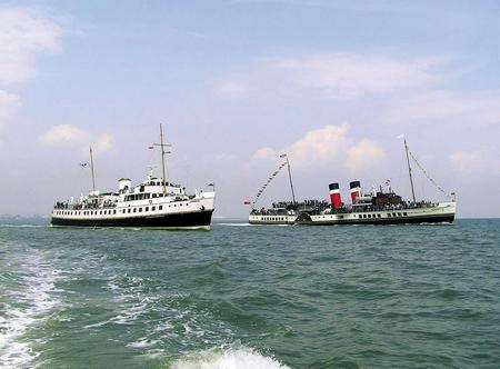 Sister ship Balmoral with the paddle steamer Waverley
