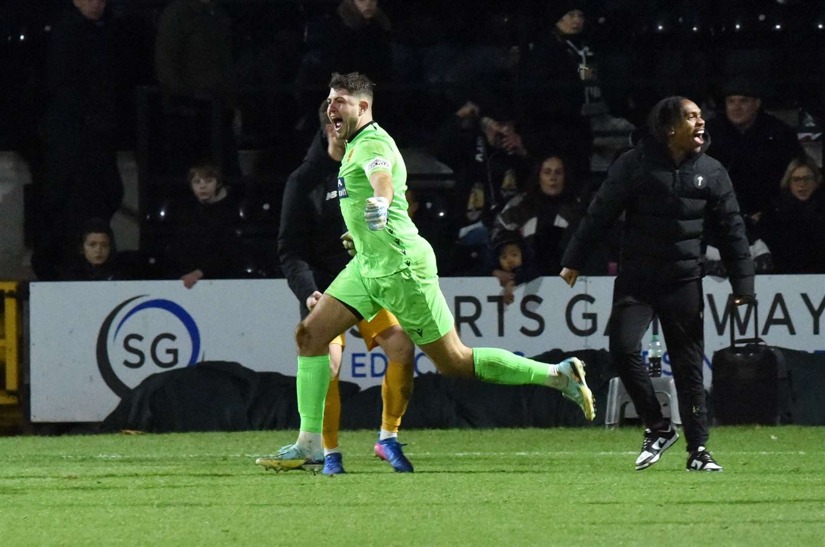 Tom Hadler enjoys the moment after Maidstone's penalty shoot-out success at Meadow Lane. Picture: Steve Terrell