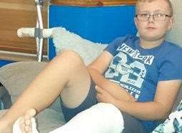Damien Baker, 10, fractured his kneecap when the roundabout collapsed
