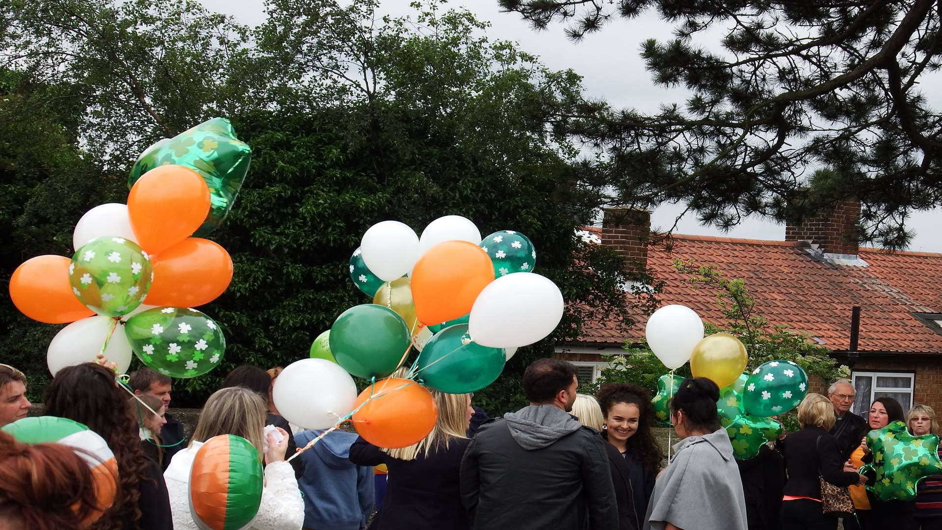 Balloons in the colours of the Irish flag were released in memory of Michael Tierney