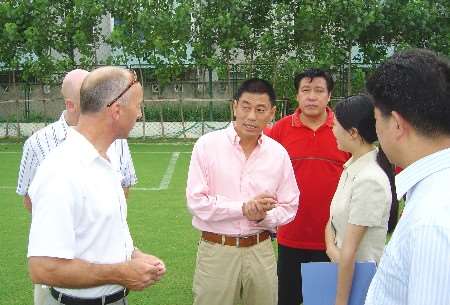 Charlton academy boss Steve Gritt talks to representatives of Shanghai Zobon