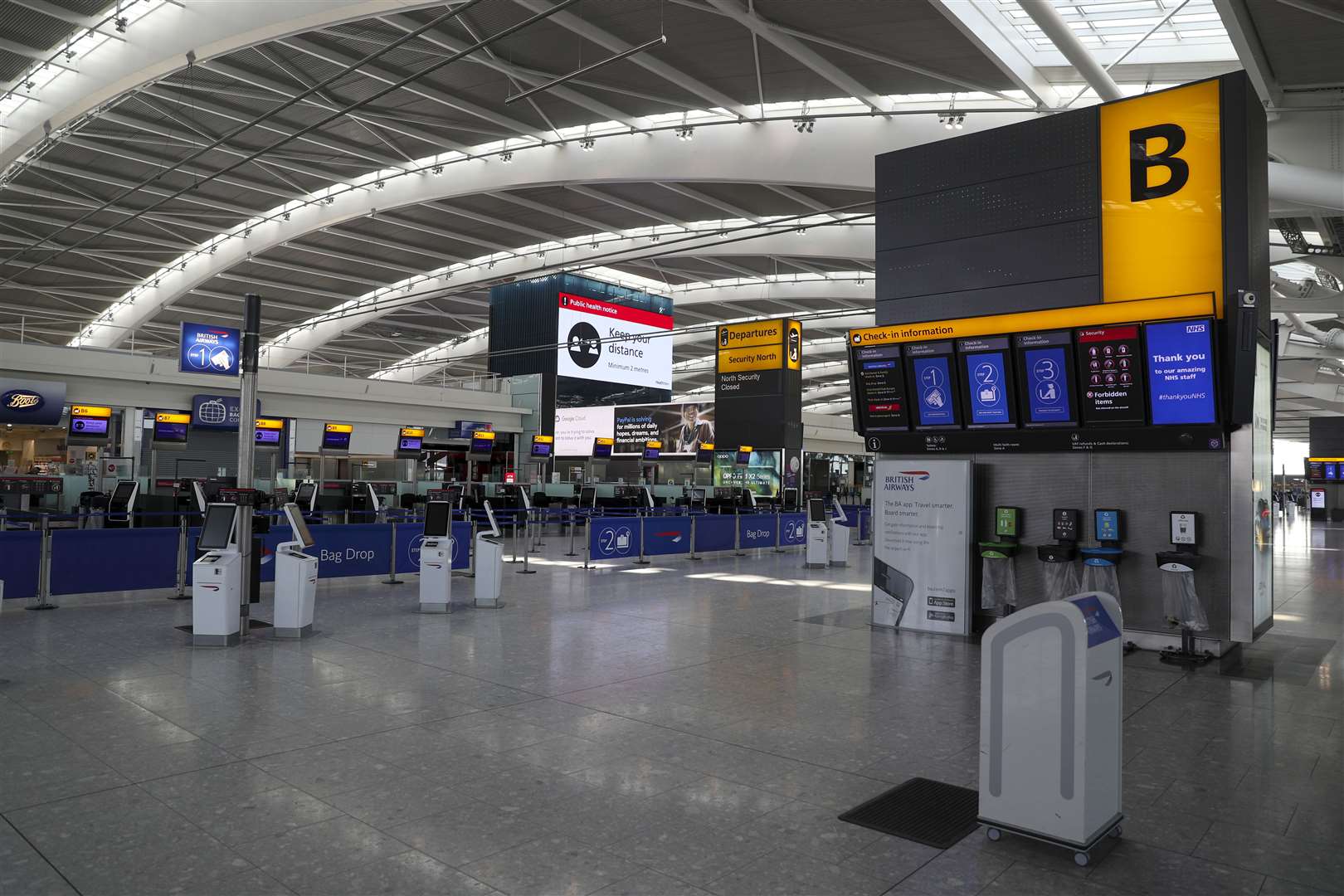 The empty concourse at Terminal 5 at Heathrow Airport (Steve Parsons/PA Wire)