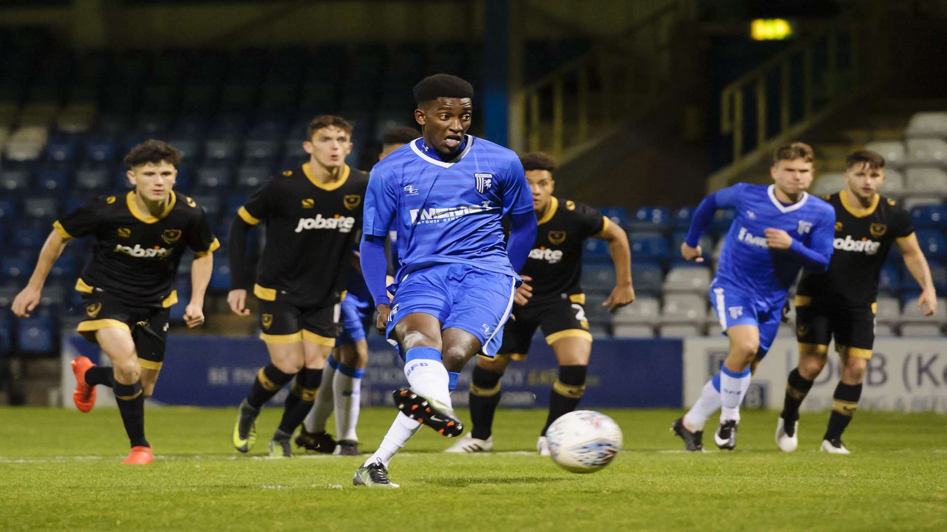 Leroy Hlabi takes a penalty for Gillingham youth. Picture: Andy Payton