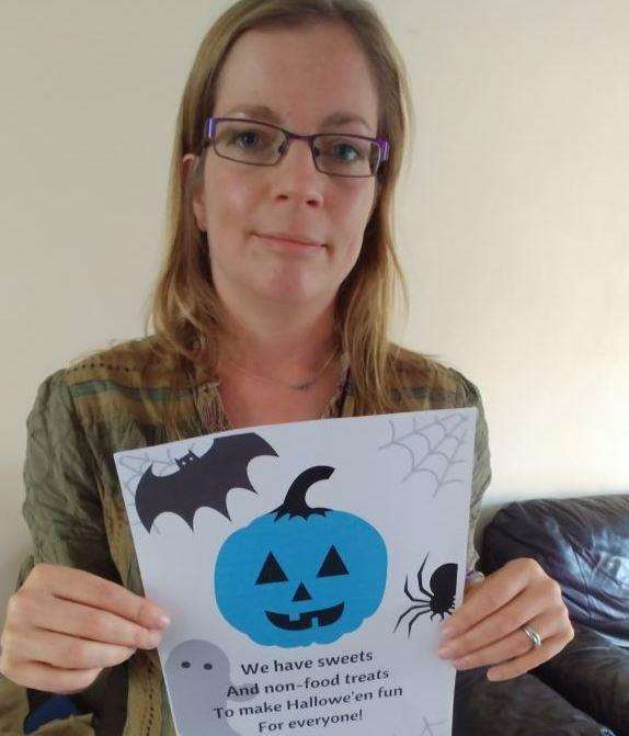 Zoe Williams will display a teal pumpkin and poster in her window at Halloween