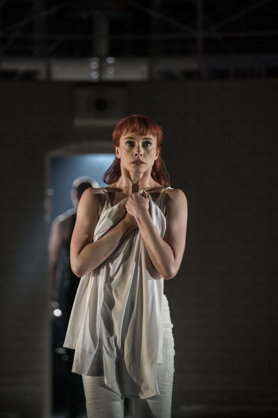 Juliet fears for her life after the security guard abuses her Matthew Bourne's Romeo and Juliet at the Marlowe Theatre. Credit: Johan Persson