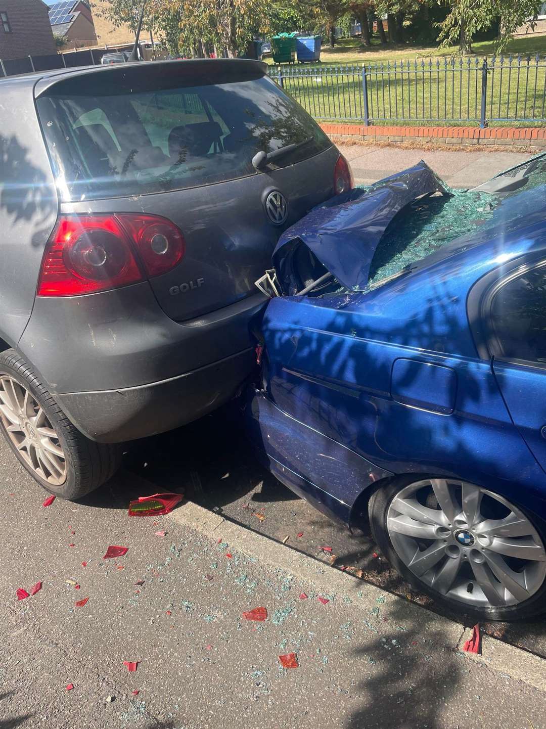 A blue BMW and silver Volkswagen golf were badly damaged