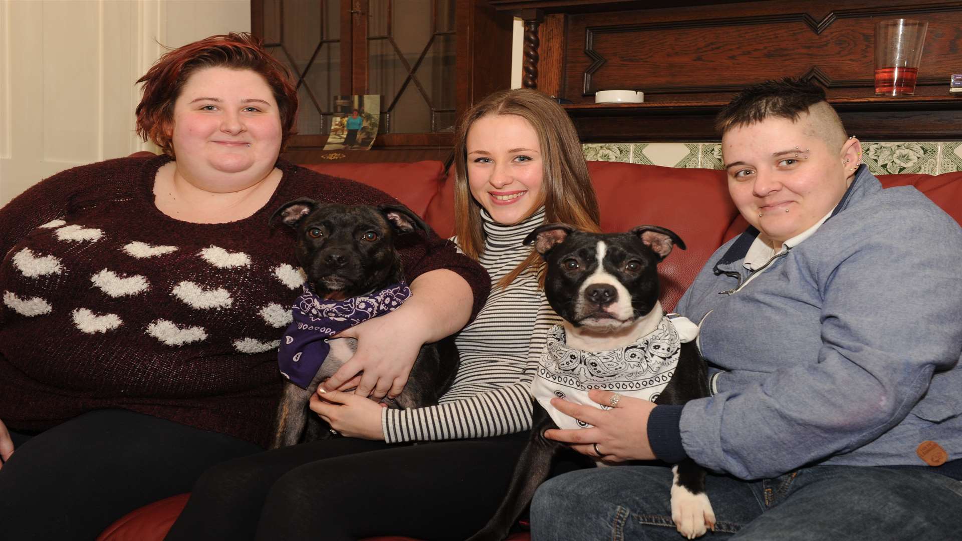 Jess Swadling with sister Rachael and Sab Clark with their dogs