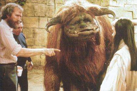 Jim Henson directing film Labyrinth, with character Ludo in the background, created by Petham puppeteer Steve Allan