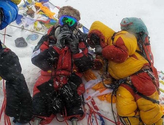Hari Budha Magar at the summit of Mount Everest. Pics: Shanta Nepali Productions/Jeet Bahadur Tamang