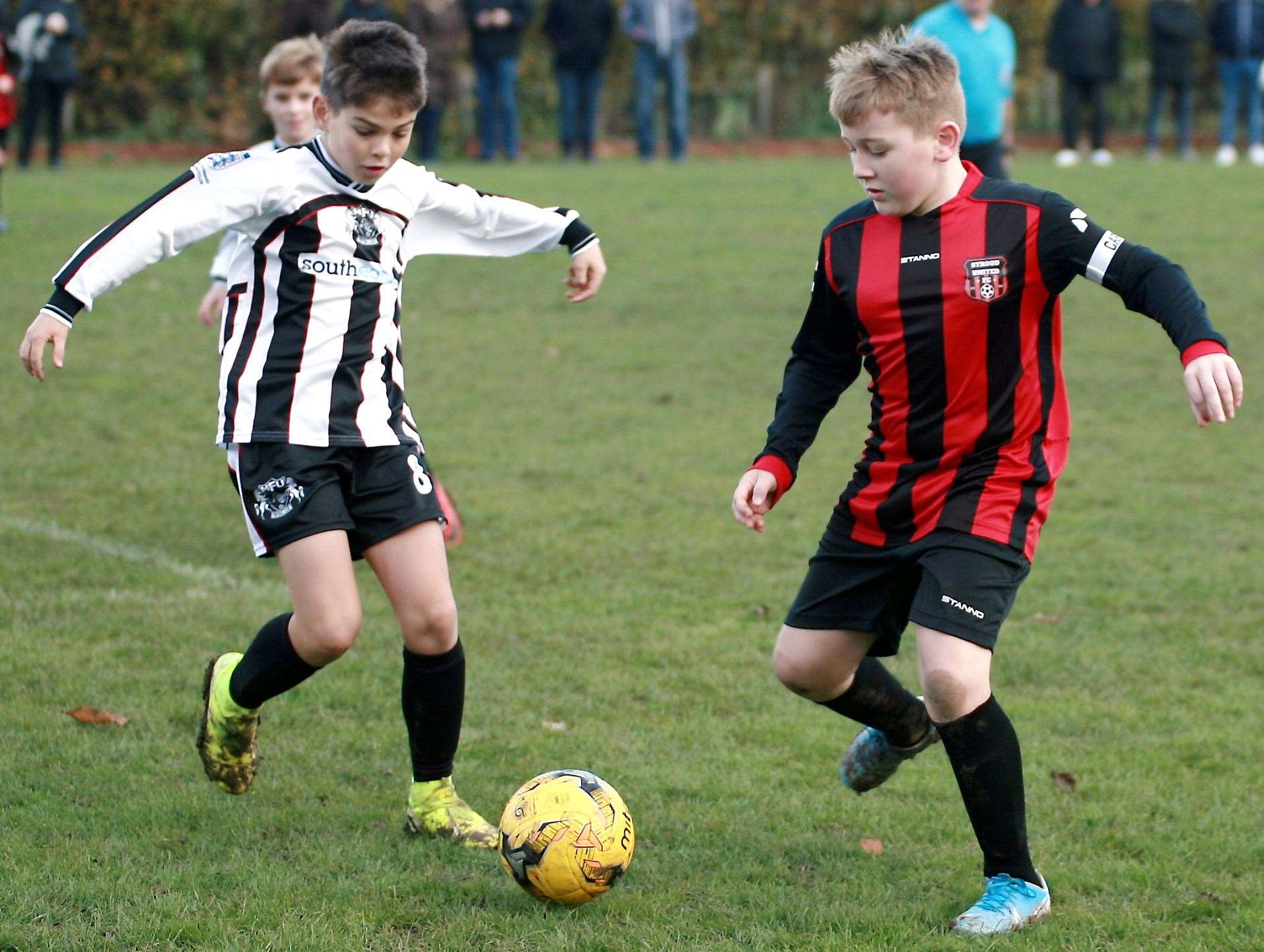 Milton and Fulston Zebras under-10s (black/white) take on Strood United under-10s. Picture: Phil Lee FM22430379