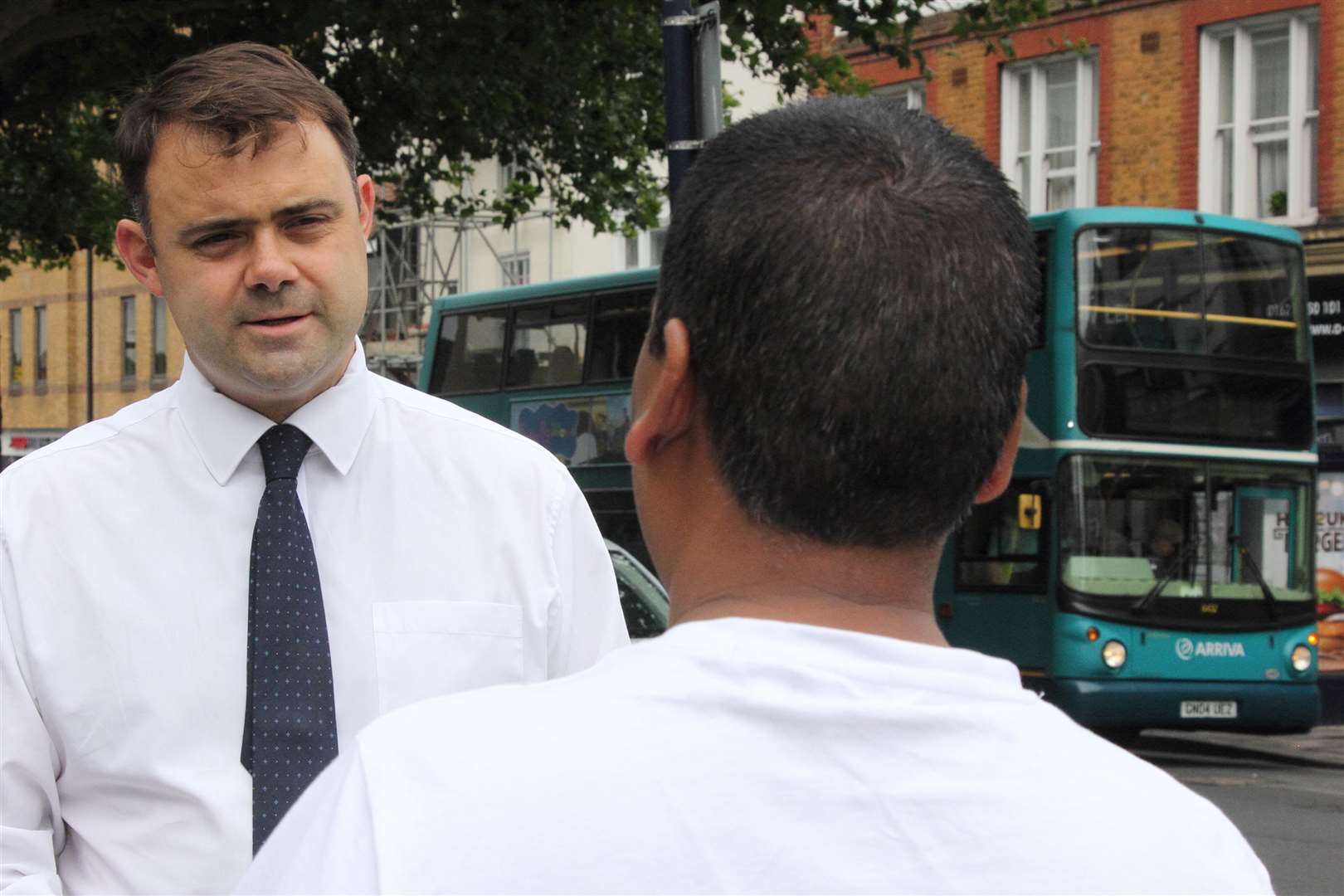 James Willis out speaking to locals about bus services (15941687)