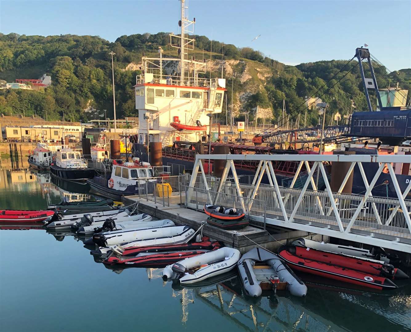 A collection of migrant dinghies at the Quay in Dover pictured after record numbers tried to cross the Channel