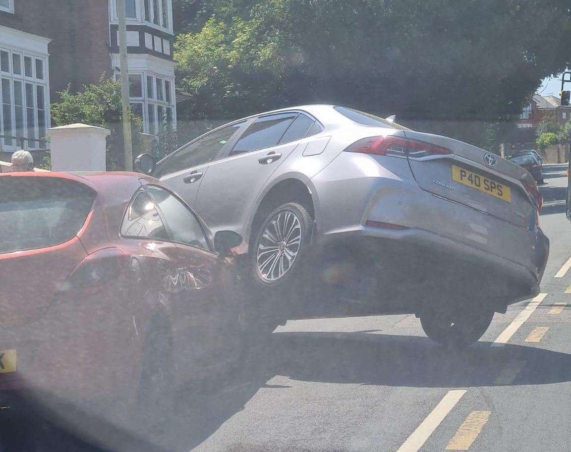 A Toyota is on another car’s bonnet in Nunnery Fields in Canterbury. Picture: Jo Bennett