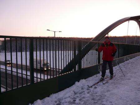 Jeremy Drummond on cross country skis crossing the footbridge over Leybourne bypass. Picture: Daniel Drummond