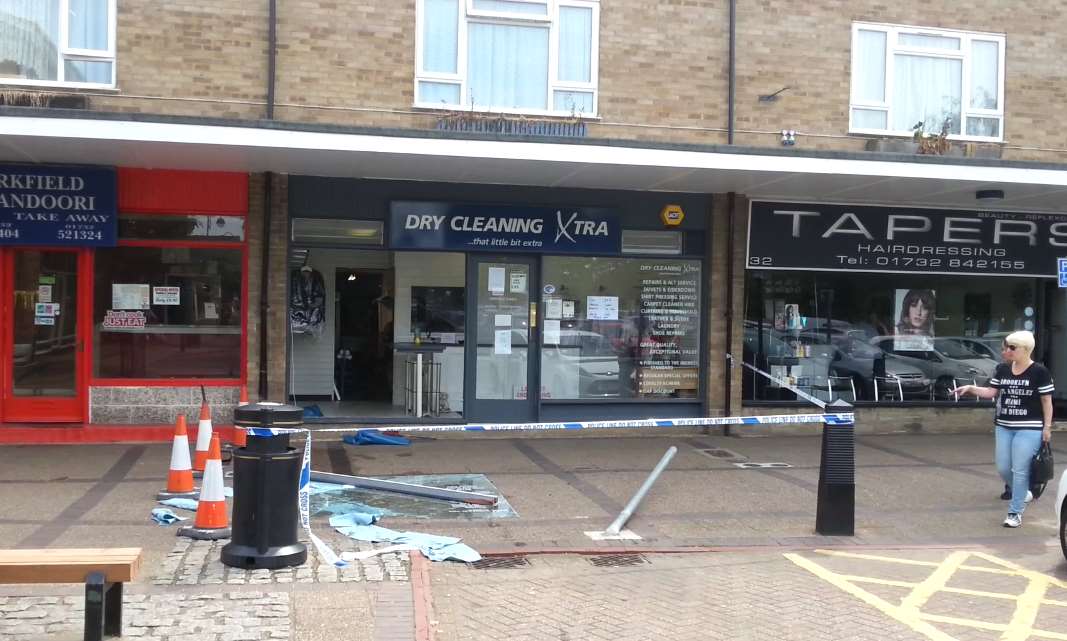 The scene at Martin Square, Larkfield after a car crashed into this shop window