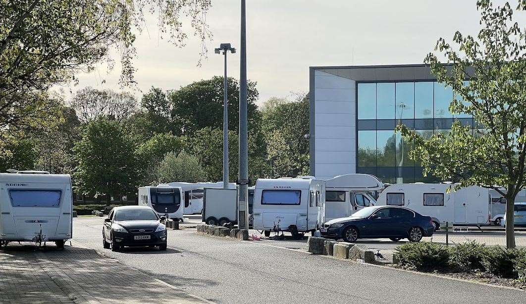 Caravans have parked in the Lloyds of London car park near Chatham Dockside Outlet Centre. Picture: Megan Carr
